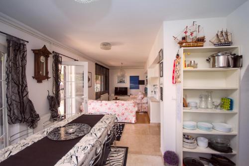 a living room with a table and a dining room at Apartmani SEA VIEW in Lokva Rogoznica