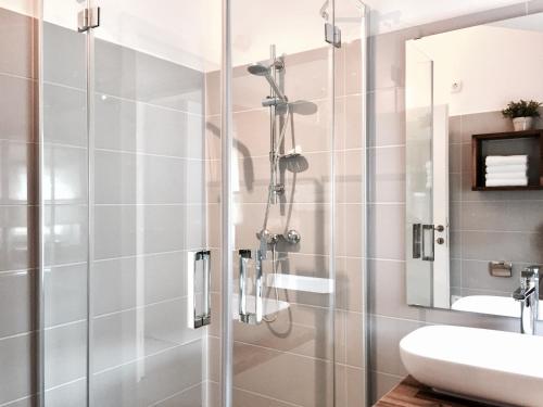 Et badeværelse på Apartmani Zivaljic