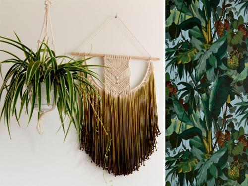 a plant hanging on a wall next to a plant at Q-Factory Hotel in Amsterdam