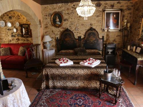 a bedroom with a bed with two pillows on it at Kimera in Piazza Armerina