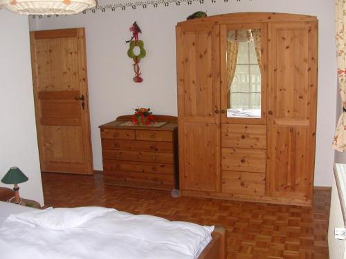 Postel nebo postele na pokoji v ubytování Gästehaus Fichtelgebirgsblick