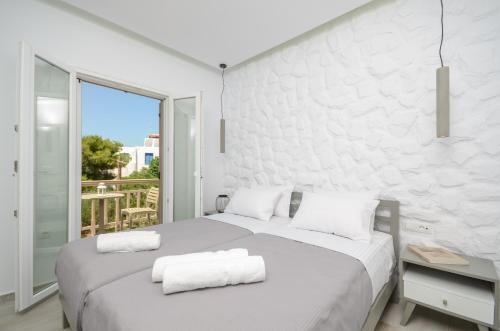 Posteľ alebo postele v izbe v ubytovaní Elegant Apartments
