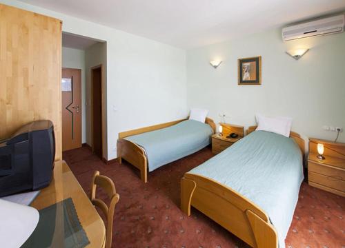 Hotel Senad od Bosneにあるベッド