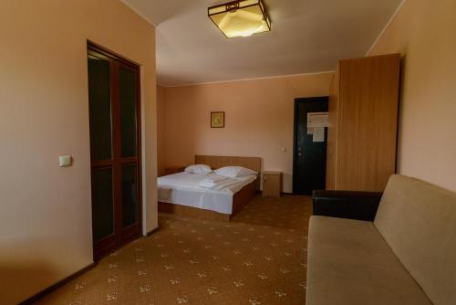 Postel nebo postele na pokoji v ubytování Hotel LaCetate