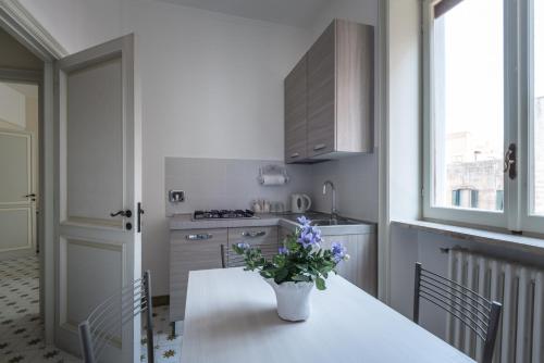 Kuchyň nebo kuchyňský kout v ubytování Suite della villa