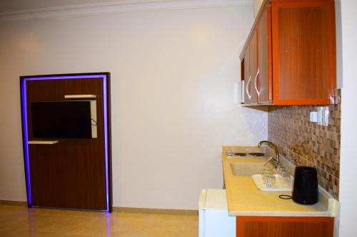 Kuchyň nebo kuchyňský kout v ubytování SHALLY RESIDENCE 2