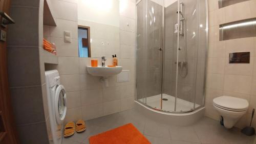Ванна кімната в Centrum Apartments