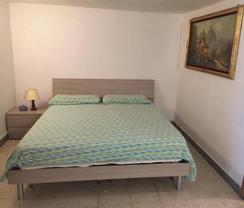 En eller flere senge i et værelse på Casa Vacanza Caronia