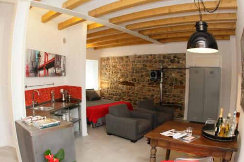 a living room with a couch and a table at Casa Galante in Cividale del Friuli