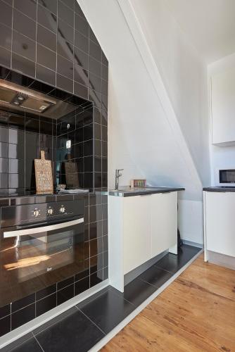 Charming apartment em Belém-Books and Canvas