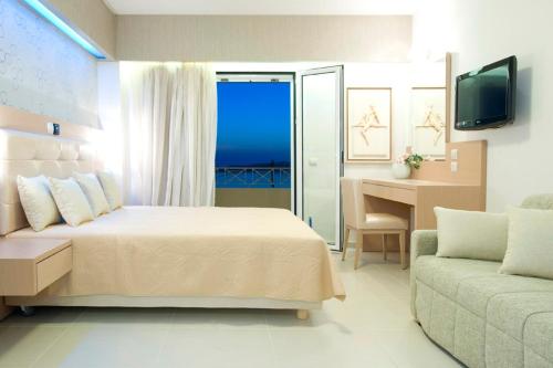 Ένα ή περισσότερα κρεβάτια σε δωμάτιο στο Hotel Philip