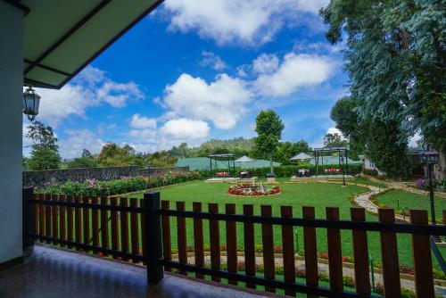 a view of a park from a fence at La Grande Villa in Nuwara Eliya