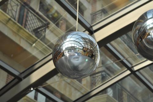 a silver disco ball hanging from a ceiling at Gran Hotel Liber & Spa Playa Golf in Noja