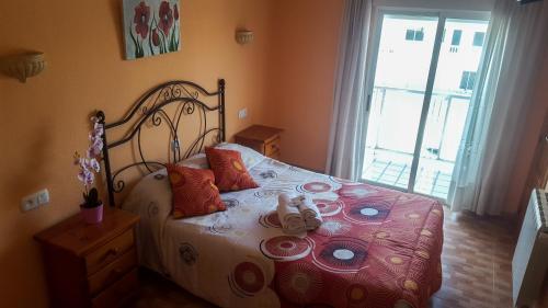 Ένα ή περισσότερα κρεβάτια σε δωμάτιο στο Hostal rural El Caminero