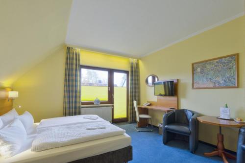 Postel nebo postele na pokoji v ubytování Hotel Morgensonne garni
