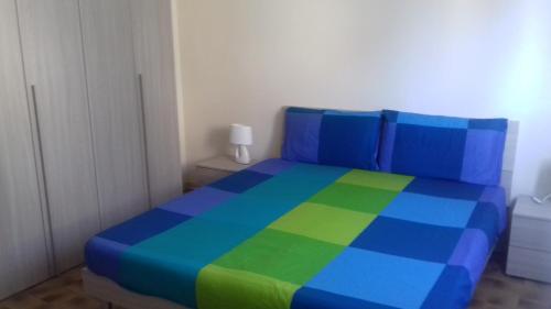 Posteľ alebo postele v izbe v ubytovaní Casa Ludovica