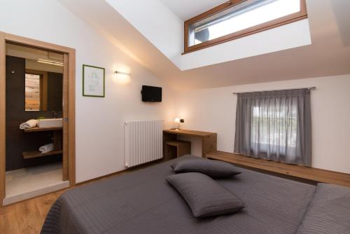 Postel nebo postele na pokoji v ubytování Hotel Ferrovia