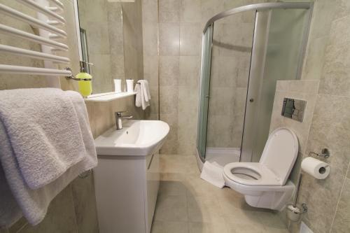 Koupelna v ubytování Zinedine Sport-Hotel