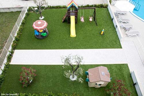 an aerial view of a backyard with a playground at Residence Acquasuite in Martinsicuro