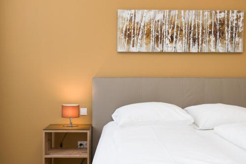 Кровать или кровати в номере Vienna Stay Apartments Pezzl 1170