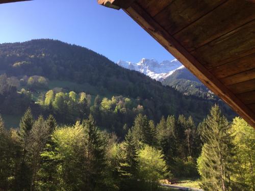 a view of a mountain from a cabin at Spacious Swiss Alpine Chalet for Nature Lovers in Val dʼIlliez