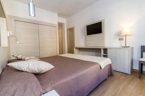 Postel nebo postele na pokoji v ubytování Eix Alcudia Hotel Adults Only