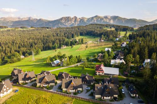 an aerial view of a village in the mountains at Domek Osada Gubałówka Zakopane in Słodyczki