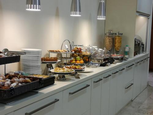 a buffet line with many different types of food at Best Western Park Hotel in Piacenza