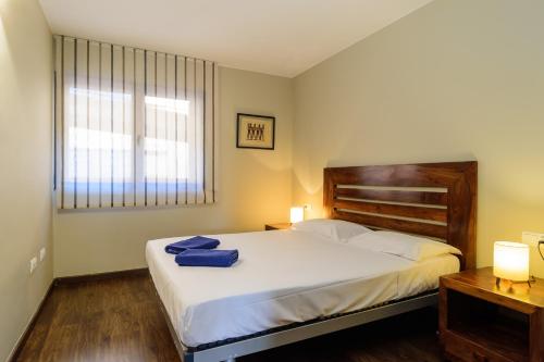 Katil atau katil-katil dalam bilik di Costabravaforrent Residencial Albons
