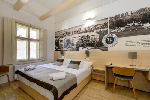 Postel nebo postele na pokoji v ubytování Klebelsberg Kastély Budapest