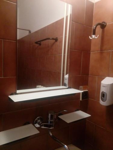  Hotel Lucia -  Room  picture :    Shower    TV    Hairdryer                            