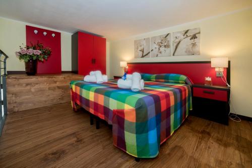 Postel nebo postele na pokoji v ubytování B&B Borgo Marinella