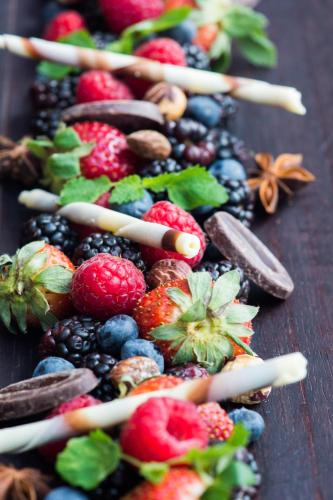 a bunch of fruits and vegetables on a wooden table at Prince of Wales in Niagara on the Lake