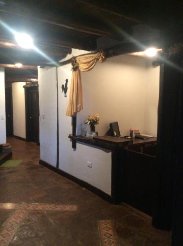 an office with a desk in a room at Samay Kirutoa Lodge in Quilotoa
