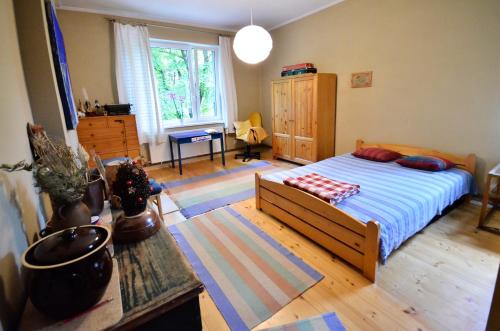 Ένα ή περισσότερα κρεβάτια σε δωμάτιο στο Apartament Krych