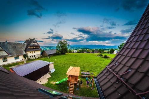 an aerial view of a backyard with a play yard at U Repy in Bańska