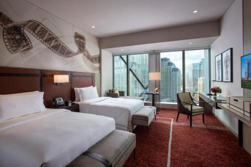 Katil atau katil-katil dalam bilik di Studio City Hotel