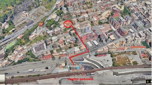 a map of a city with a red marker at memeapartments in Genova