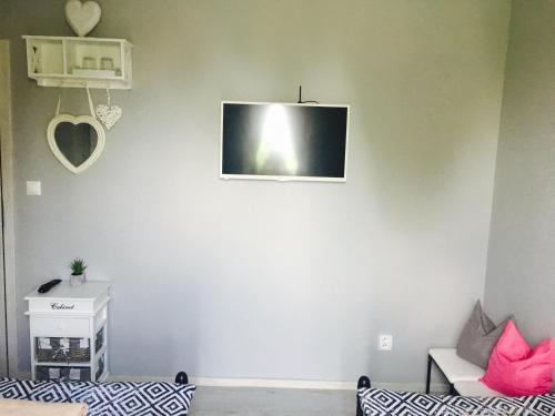 Televisyen dan/atau pusat hiburan di Mini Motel