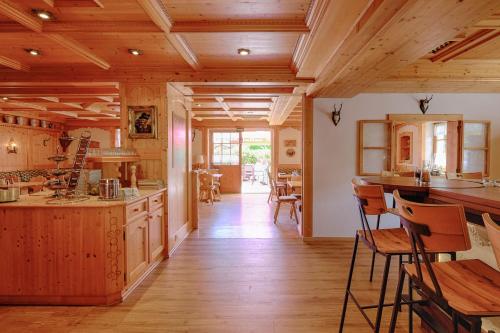 Kuchyň nebo kuchyňský kout v ubytování Hotel Paintner
