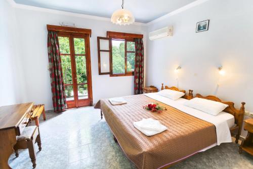 A bed or beds in a room at Saint Nicolas Bungalows