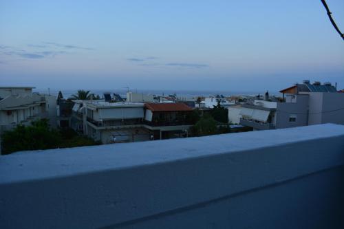 a view of a city from the roof of a building at Thegaia Studios in Rethymno Town