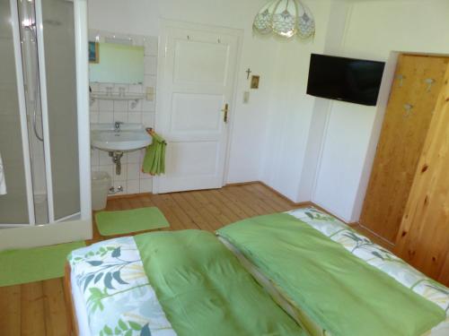 Postel nebo postele na pokoji v ubytování Ferienhaus Wohleser