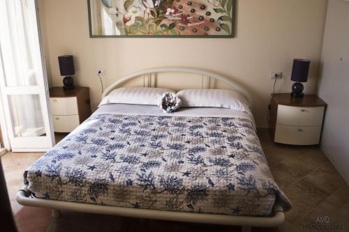 Een bed of bedden in een kamer bij Los Flamingos