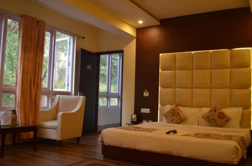 Ein Bett oder Betten in einem Zimmer der Unterkunft Jagjeet's Sikkim Retreat