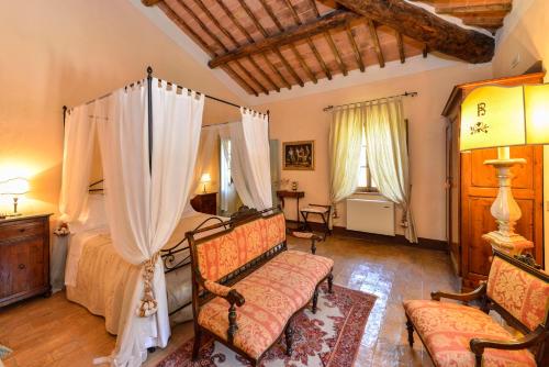 Ένα ή περισσότερα κρεβάτια σε δωμάτιο στο Villa Cicolina