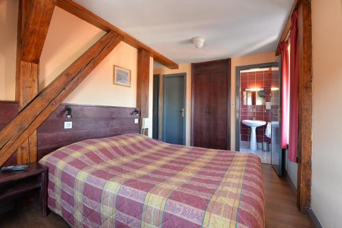 Postel nebo postele na pokoji v ubytování Hotel Restaurant Dontenville