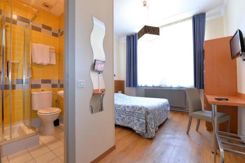 Koupelna v ubytování Hotel Restaurant Dontenville