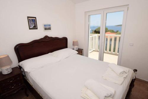 Кровать или кровати в номере Apartments Costa Rica