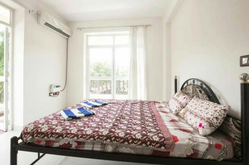 Postel nebo postele na pokoji v ubytování Dona Rosa Holiday Apartment